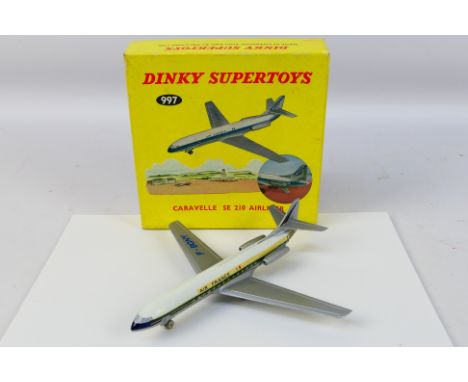 Dinky Toys - A boxed Dinky Toys #997 Caravelle SE 210 Airliner. The 'Air France' model in silver, white and blue, with the ma
