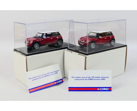 Corgi - Two ex-shop stock Corgi 2005 New Mini Cooper Preview Models. The models appear to be in Mint condition and sit within