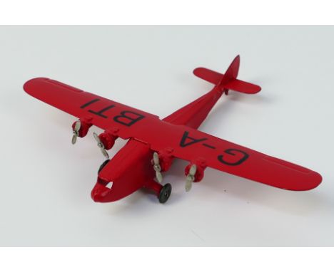 Dinky Toys - An unboxed pre-war Dinky Toys #60a Imperial Airways Liner. The model in red, features four 2-blade silver tinpla
