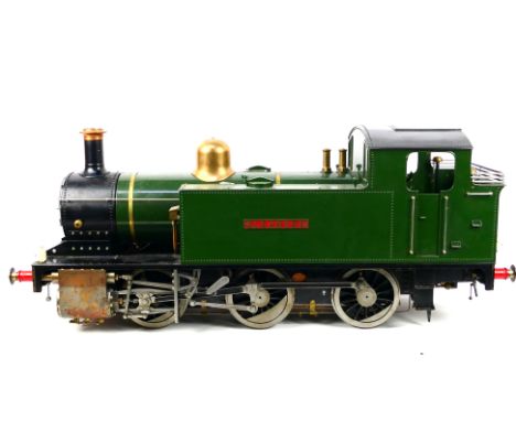 A scratch built 5 inch gauge Simplex style 0-6-0 steam locomotive, composing green body with closed cab named 'Eleanore'. The