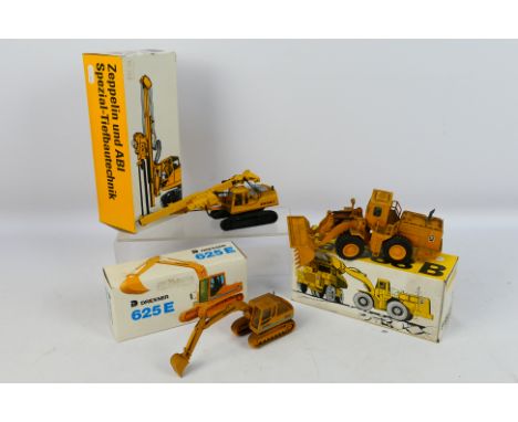 Conrad - NZG - 3 x boxed construction models in 1:50 scale, CAT 988B Loader # 167, Zeppelin ZR28T # 2815 and Dresser 625E Exc