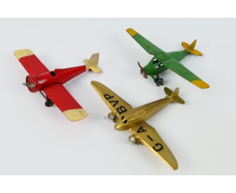 Dinky Toys -Three unboxed pre-war Dinky Toys model aircraft. Lot includes Dinky Toys 60b De Havilland Leopard Moth in green w