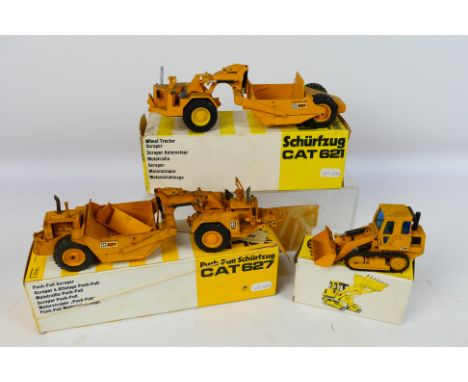 NZG - 3 x boxed construction models in 1:50 scale, CAT 953 Tracked Loader # 223, CAT 621 Scraper # 122 and CAT Scraper 627 # 