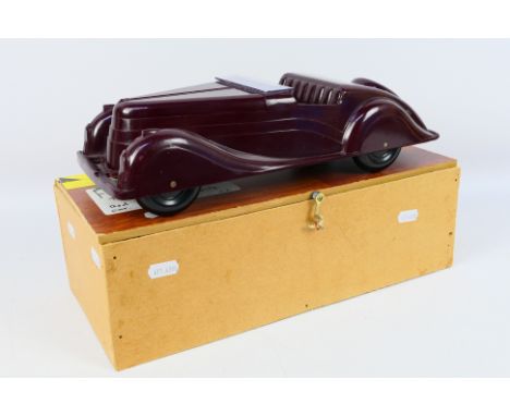Codeg - A rare streamlined Bakelite sports car called the 'Modern Motor Car' by Codeg. It is 34 cm long and appears in Very G