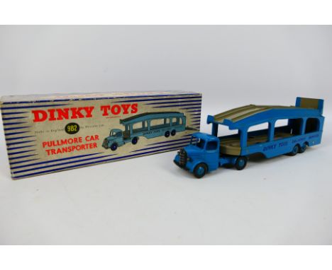 Dinky Toys - A Pullmore Car transporter in good-very good condition. Some signs of use, minor paint chips to one side. Box is