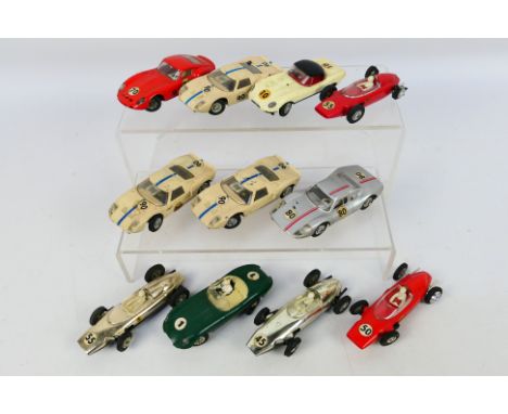 Jouef - A group of 10 unboxed slot cars from Jouef. Lot includes Ferrari 250 GTO; Jaguar E-Type; Ford GT40 and similar. Model