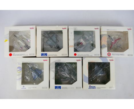 Herpa - A boxed collection of seven 1:200 scale diecast military aircraft from Herpa. Lot includes #554466 Luftwaffe Eurofigh