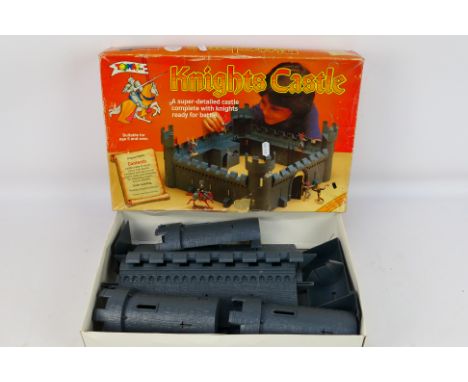 Timpo - Toyway - A boxed Timpo plastic 'Knights Castle'. The castle shows signs of play appearing to be in relatively Good co