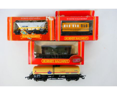 Hornby - 4 x OO gauge wagons including Track Cleaning Coach # R.296, Hopper Wagon # R.238, 20 Ton Brake Van # R6078 and simil