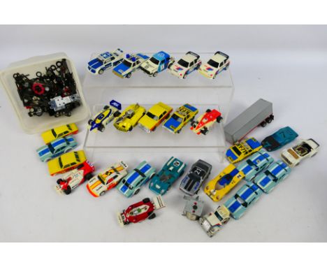 Aurora - Tomy - An unboxed collection of Auraor  / Tomy slot cars, plus a group of mainly Aurora slot car body shells, and sp