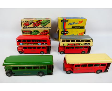 Minic - Triang - Tinplate - Four vintage tinplate Busses. Items are in a worn condition with various paint chips flakes to th