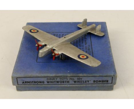 Dinky Toys - A boxed pre-war Dinky Toys #60v Armstrong Whitworth 'Whitley' Bomber. The model in silver with blue roundels, fe
