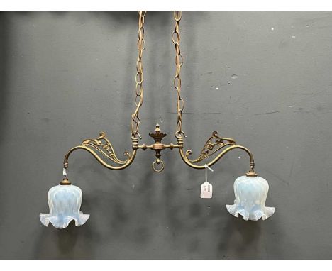 A Victorian brass ceiling light, the twin swan neck branches with pierced floral decoration, with opalescent glass shades, ch