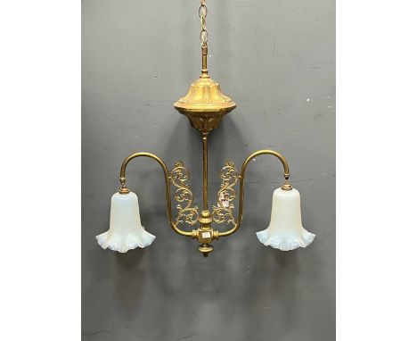 A Victorian brass ceiling light, the twin swan neck branches with dimpled moulded opalescent glass shades, Approx 60cm high a