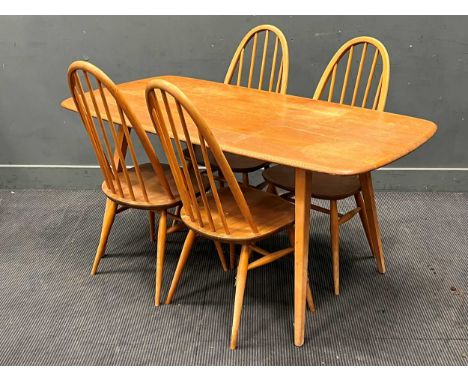 An elm and beech Ercol style table 72 x 152 x 76cm, 4 chairs and coffee table 37 x 105 x 47cm (6)