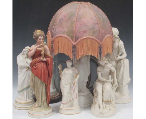 A Copeland Parian figure of Lurline playing a lyre with a sturgeon at her feet; a Worcester decorated figure playing a flute;