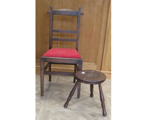 Attributed to Arthur W. Simpson (1857-1922) of Kendal, an oak valet chair,  of ladder back design with rear projecting hangin