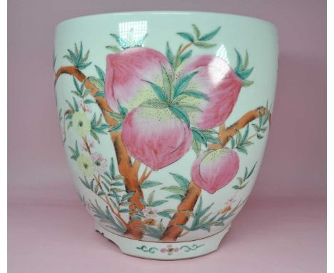 A Chinese ceramic planter mid 20th century decorated with nine peaches and blossom, with integral bracket foot. 23H x 23.5cm