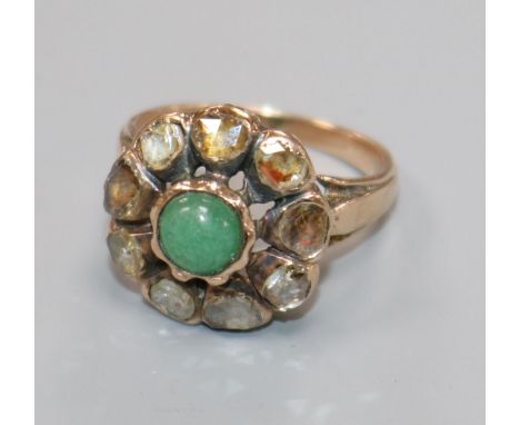 A 19th century yellow metal, cabochon cut emerald and rose cut diamond set cluster ring, size J.