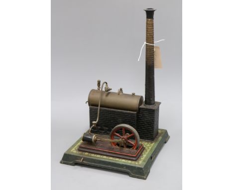 An early 20th century tinplate stationery engine with boiler and chimney, probably Bing