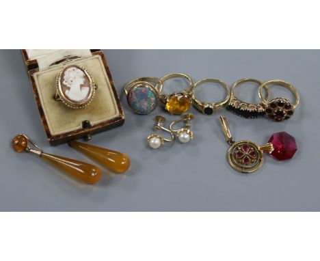 Six assorted gem set rings including five 9ct gold and other items including unmounted white opal and two pairs of 9ct ear st