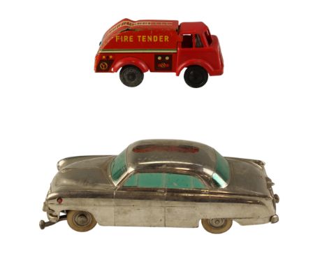 A 1950s Prameta Opal Kapitan 555 clockwork diecast car together with a 1960s Wells Brimtoy Pocketoys fire tender,  former 14 