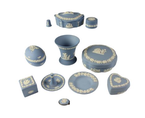 A group of Wedgwood blue Jasperware, comprising six trinket boxes, a ring holder, a thimble, a brooch, a vase and an ashtray,