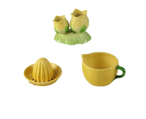 A Carlton Ware lemon squeezer and jug in the form of lemons, together with a Carlton Ware double bud vase in the form of tuli