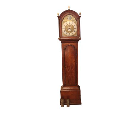 A George III long case clock by Henry Munsden of Chelmsford, having an 8-day movement and arched brass face with silvered hou
