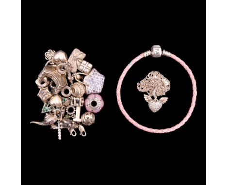 A Pandora charm bracelet and a similar white metal winged loveheart necklace together with a small group of elephant, handbag