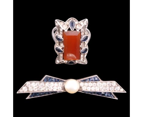 A vintage Art Deco influenced paste-set white metal dress ring, 26 mm x 17 mm, Q/R, together with a stylised bow brooch