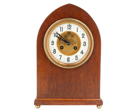A late 19th Century Maple & Co of Paris oak-cased mantle clock by Vincenti, of lancet-form having a two-train movement with B