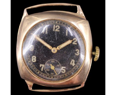 A 1945 9ct gold wristwatch, having a Swiss 15-jewel movement and military-style black face with railtrack minutes chapter, lu
