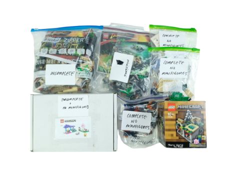 A group of built / unboxed Minecraft, Ninjago, Nexo Knights and Indiana Jones Lego kits, including Micro World The Village (2