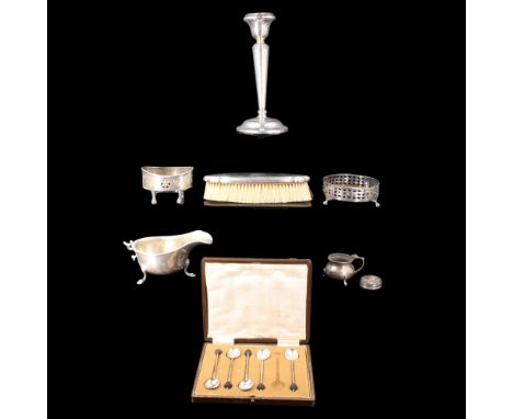 Various items of silver, including a silver-backed hairbrush, a candlestick (loaded), a gravy boat (a/f), and five coffee spo