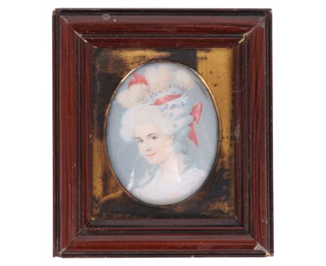 A portrait miniature of a late 18th Century lady dressed in fine attire with flamboyant ribbon-tied coiffure, overpainted pho