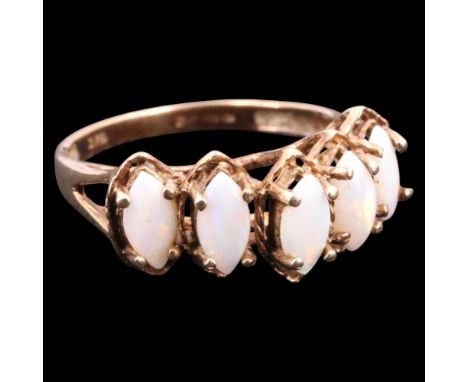 A near contemporary five-stone opal ring, comprising an arch of marquise cabochons, each claw-set within and above conforming