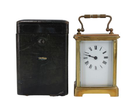 A late 19th / early brass corniche-cased carriage clock and leather-covered transit case, 14.5 cm including handle, (a/f)
