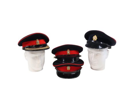 Four QEII Royal Army Ordnance Corps dress peaked caps 