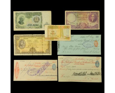 A 1900 Alyth Town and County Bank cheque, together with 1936 and 1947 Anstruther National Bank of Scotland cheques, and four 