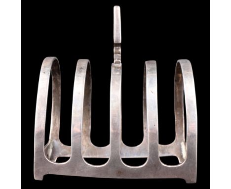 A 1920s silver four-slice toast rack, having arched divisions and an open arrowhead-shaped handle, Mappin &amp; Webb, Sheffie