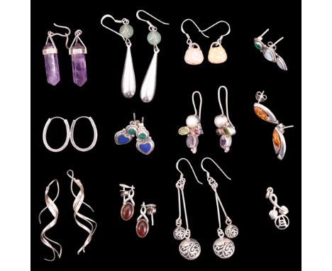 A group of contemporary white metal earrings together with a silver Charles Rennie Mackintosh style pendant, including sun-sp