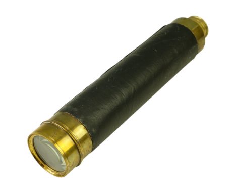 A late 19th Century brass three-draw telescope, having a leather-covered body tube and 1 1/2 inch objective, 59 cm extended, 