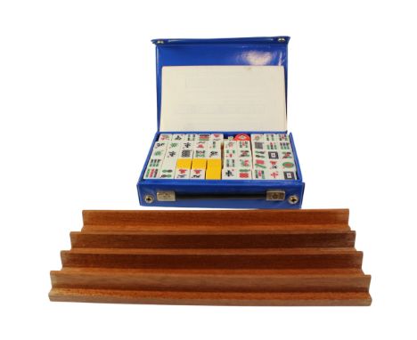 A Mah Jong set with tile racks
