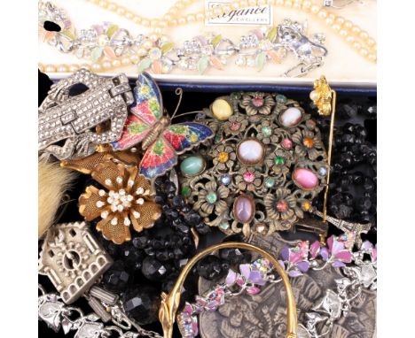 A group of vintage costume jewellery including a marcasite lizard bracelet, a French jet necklace, Eiffel Tower and cuckoo cl