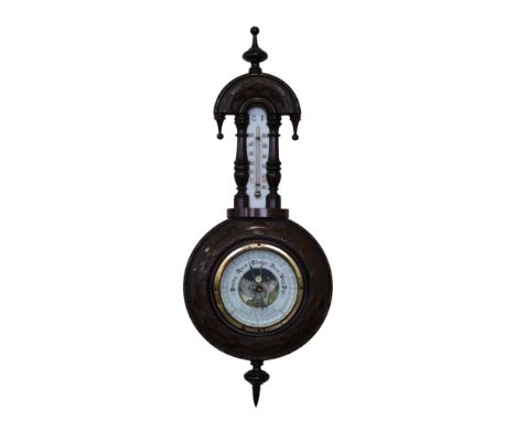 A late 19th / early 20th Century carved mahogany banjo barometer, bearing an inscription to the dial, "Presented by The Count