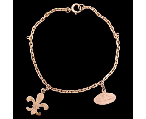 An early 20th Century 9 ct yellow metal box-link charm bracelet, bearing rugby ball and Fleur-de-lys charms, 18 cm, 5.2 g, (m