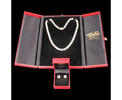 A single strand pearl necklace and stud earrings demi-parure, including a necklace of uniform 6.5 mm pearls with sapphire- an