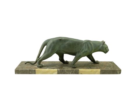 M Leducq (French, 1879-1955), a patinated bronze sculpture of a stalking panther or other big cat, on a marble and alabaster 