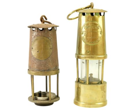 Two early / mid 20th Century miners' safety lamps, by The Protector Lamp &amp; Lighting Co Ltd of Eccles, tallest 33 cm (incl